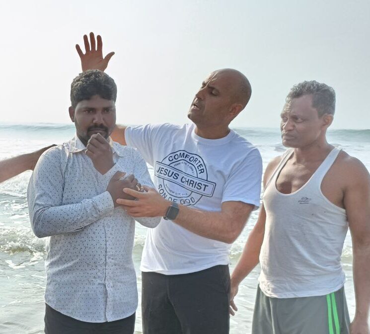 A baptism by the sea during the ministry visit