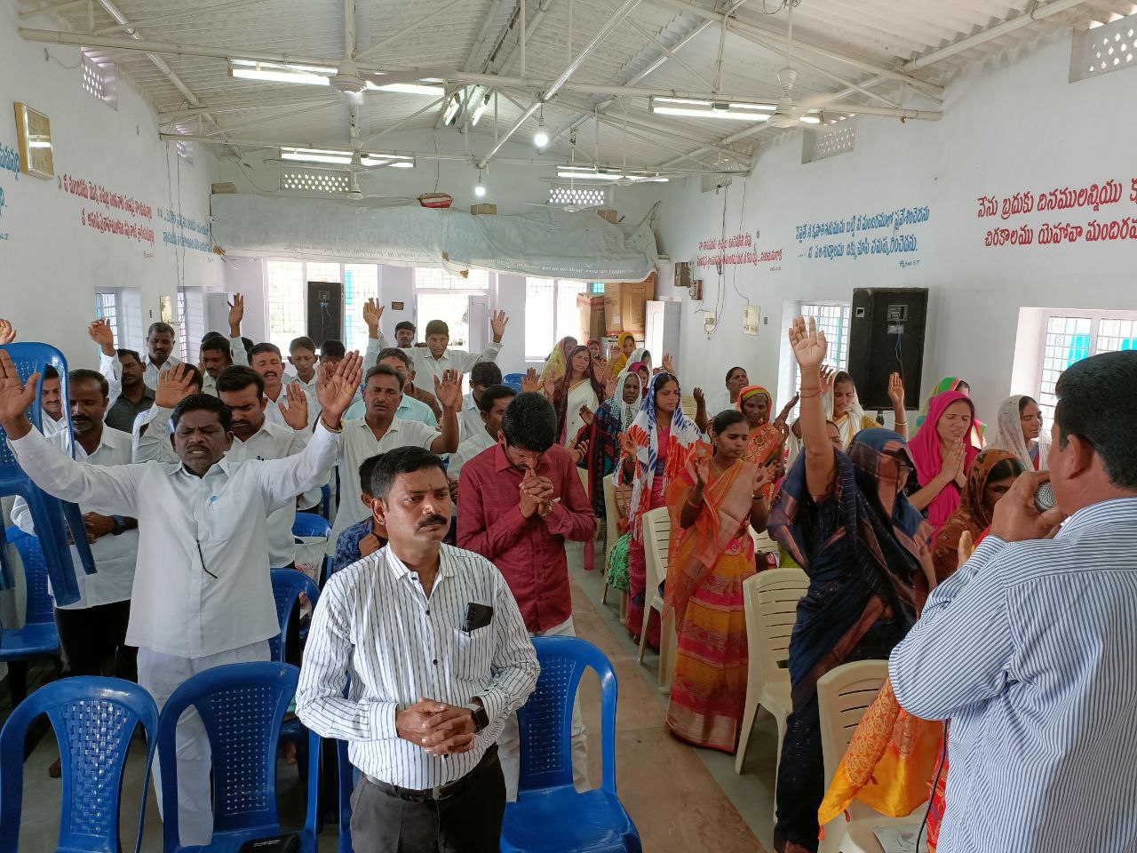 Village outreach gathering during ministry work